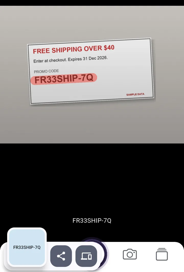 SwipeScan app on Android: a stroke over the promo code FR33SHIP-7Q on a sample coupon; the result chip shows FR33SHIP-7Q
