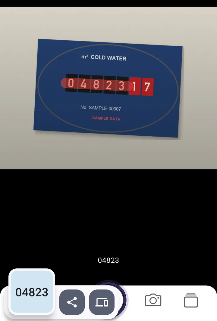 SwipeScan app on Android: a stroke over the five black drums of a sample cold-water meter; the result chip shows 04823