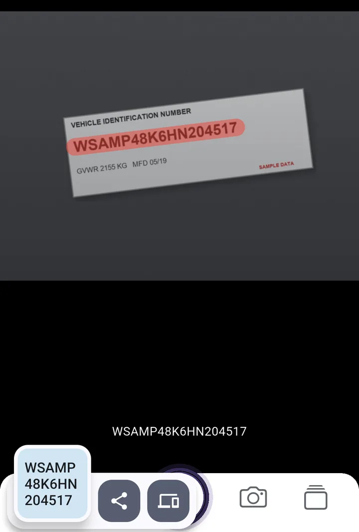 SwipeScan app on Android: a stroke over WSAMP48K6HN204517 on a sample VIN plate; the result chip shows the same seventeen characters