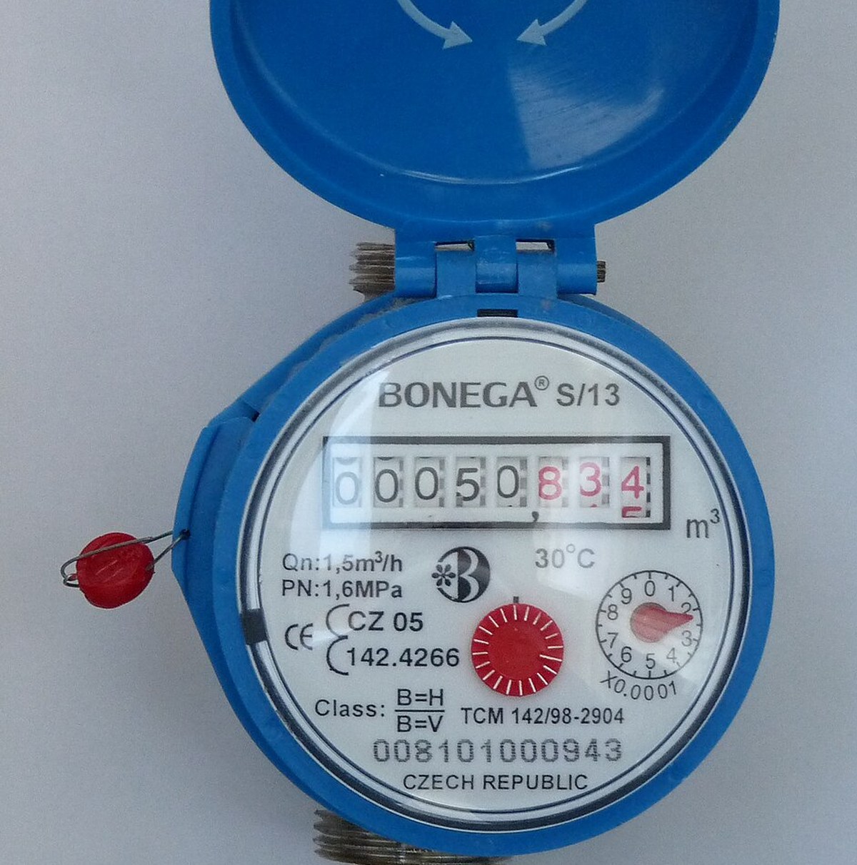 Close-up of a Bonega water meter register. Five black digits read 00050, then three red digits read 834, with the m3 unit marked to the right.